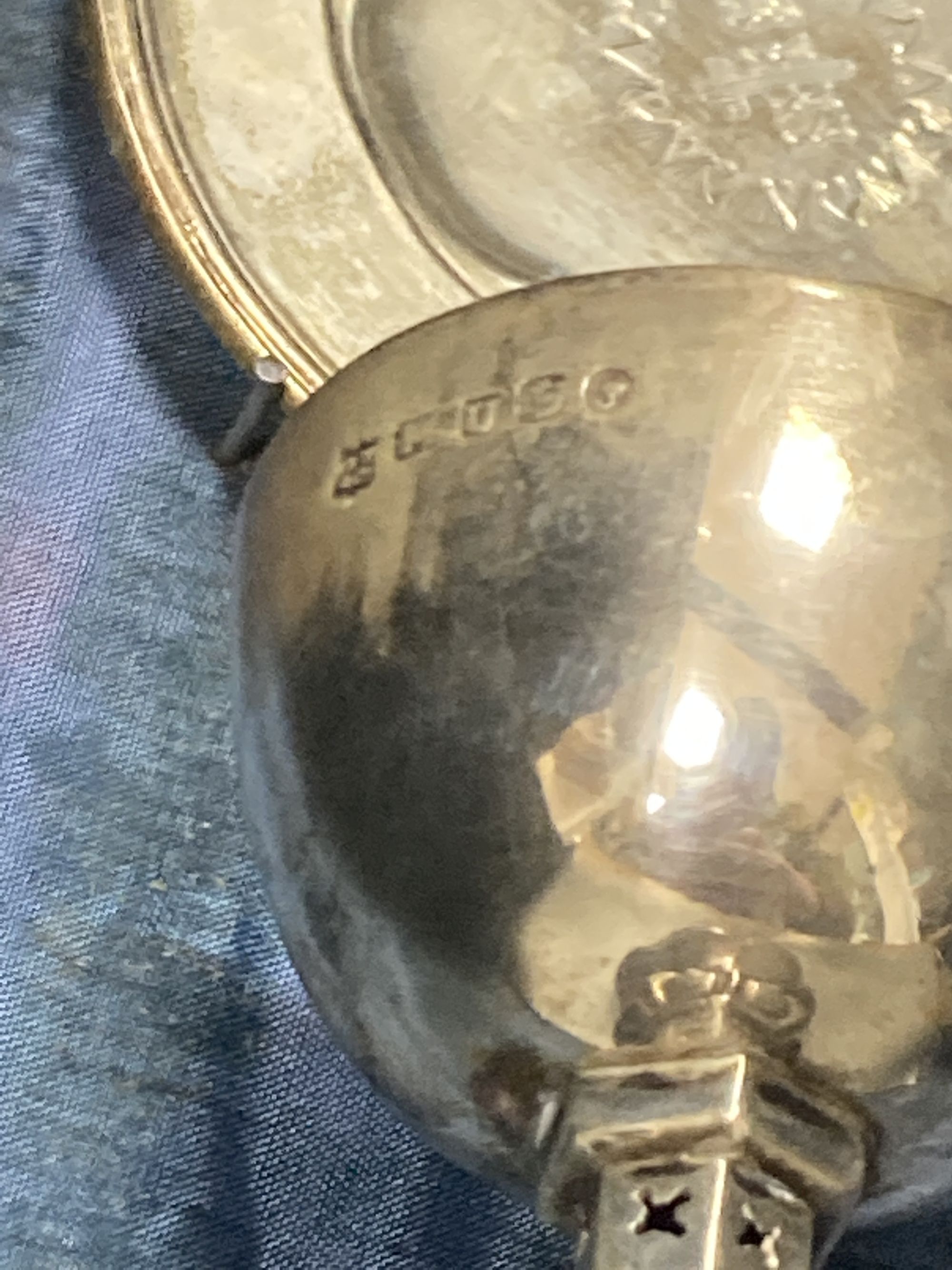 A Victorian silver communion chalice and paten, Henry Wilkinson & Co, Sheffield, 1862, chalice 93mm, in display case.